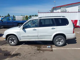 2002 Suzuki XL7 Standard z VIN JS3TX92V324125187, wystawiony jako IAAI lot #42195273 z przebiegiem 243 050 mil mil oraz . Historia ofert i sprzedaży dostępna na DreamBid. Obrazek 14.