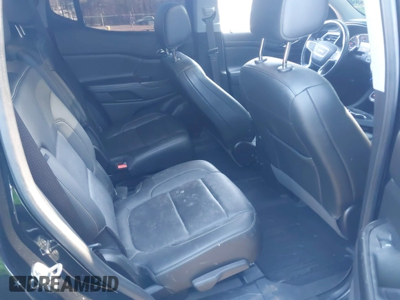 2021 GMC Acadia SLT z VIN 1GKKNULS6MZ128487, wystawiony jako IAAI lot #41918386 z przebiegiem 57 426 mil mil oraz . Historia ofert i sprzedaży dostępna na DreamBid. Obrazek 8.