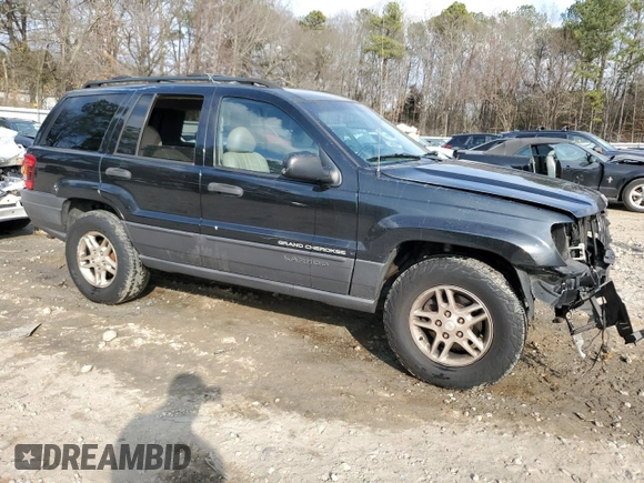 2003 Jeep Grand Cherokee Laredo with VIN 1J4GX48S43C609354, listed as a Copart auction lot 43924595 with 212,949 mi miles and Salvage Title. Bid and sale history available at carsss.com. Image 4.