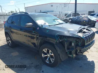 2018 Jeep Cherokee Trailhawk with VIN 1C4PJMBB4JD567422, listed as a IAAI auction lot 42164149 with 107,021 mi miles and . Bid and sale history available at DreamBid. Image 1.
