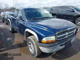 2004 Dodge Dakota SLT with VIN 1D7HG42N44S519910, listed as a IAAI auction lot 41737881 with 154,008 mi miles. Bid and sale history available at carsss.com. Image 1.