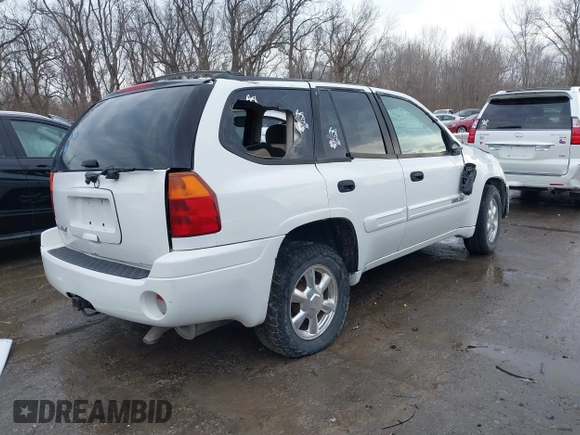 2005 GMC Envoy SLT with VIN 1GKDT13S352165407, listed as a IAAI auction lot 41345208 with 251,468 mi miles. Bid and sale history available at carsss.com. Image 4.