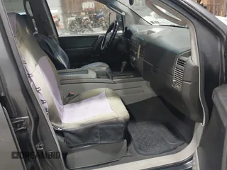 2004 Nissan Titan LE with VIN 1N6AA07B84N544745, listed as a IAAI auction lot 42195072 with 357,986 mi miles. Bid and sale history available at carsss.com. Image 5.