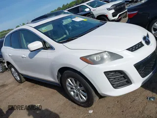 2010 Mazda CX-7 Sport with VIN JM3ER2W56A0346749, listed as a IAAI auction lot 42062520 with 214,959 mi miles and . Bid and sale history available at DreamBid. Image 1.