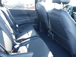 2023 Honda Odyssey Touring with VIN 5FNRL6H80PB005769, listed as a IAAI auction lot 41280858 with 7,041 mi miles and . Bid and sale history available at DreamBid. Image 8.