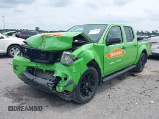 2020 Nissan Frontier SV with VIN 1N6ED0EA1LN711089, listed as a IAAI auction lot 42356365 with 59,059 mi miles and . Bid and sale history available at DreamBid. Image 2.