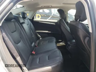 2014 Ford Fusion Titanium с VIN 3FA6P0K90ER363283, выставлен на аукционе Copart как лот 55156795 с пробегом 54 099 миль миль и Списание • Salvage title. История ставок и продаж доступна на DreamBid. Изображение 10.