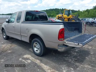 1998 Ford F-150 with VIN 1FTZX1760WNB21027, listed as a IAAI auction lot 42651506 with 189,442 mi miles and . Bid and sale history available at DreamBid. Image 3.