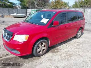 2012 Dodge Grand Caravan SXT with VIN 2C4RDGCG2CR373273, listed as a IAAI auction lot 41868364 with 130,197 mi miles. Bid and sale history available at carsss.com. Image 2.