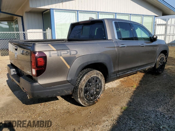 2022 Honda Ridgeline RTL-E with VIN 5FPYK3F79NB037874, listed as a Copart auction lot 65616285 with 39,856 mi miles and Clean title. Bid and sale history available at DreamBid. Image 3.