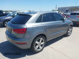 2015 Audi Q3 Prestige with VIN WA1GFCFS7FR013818, listed as a IAAI auction lot 41975076 with 60,295 mi miles and . Bid and sale history available at DreamBid. Image 4.