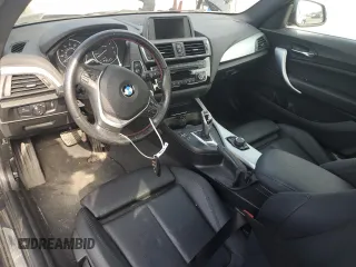 2016 BMW 2 Series 228i xDrive with VIN WBA1G9C52GV598419, listed as a Copart auction lot 62464515 with 49,793 mi miles and Salvage title. Bid and sale history available at DreamBid. Image 8.