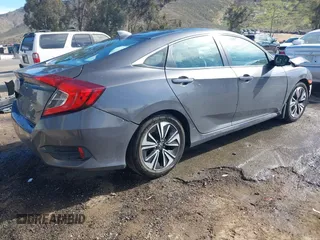 2017 Honda Civic EX-T with VIN 2HGFC1F33HH650782, listed as a IAAI auction lot 41685090 with 113,319 mi miles and . Bid and sale history available at carsss.com. Image 4.