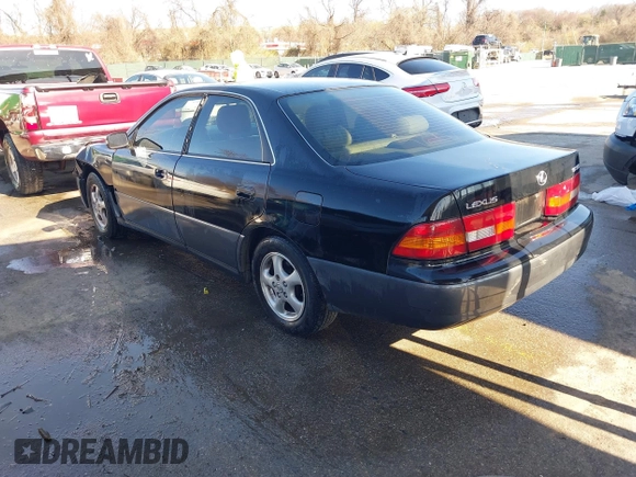 1997 Lexus ES 300 Luxury Sport Sdn with VIN JT8BF22GXV5003056, listed as a IAAI auction lot 41806886 with 130,063 mi miles. Bid and sale history available at carsss.com. Image 3.