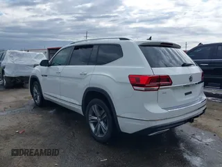 2019 Volkswagen Atlas SEL R-Line with VIN 1V2RR2CA6KC594588, listed as a IAAI auction lot 41686713 with 125,180 mi miles and . Bid and sale history available at DreamBid. Image 3.