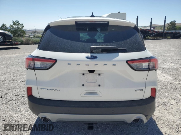 2020 Ford Escape Titanium Hybrid with VIN 1FMCU9DZ9LUC30255, listed as a Copart auction lot 59558215 with 46,303 mi miles and Salvage title. Bid and sale history available at DreamBid. Image 6.