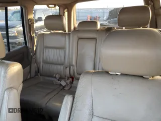 2000 Toyota Land Cruiser z VIN JT3HT05J0Y0122711, wystawiony jako Copart lot #86929954 z przebiegiem Nie podano mil oraz Czysty tytuł • Clean title. Historia ofert i sprzedaży dostępna na DreamBid. Obrazek 10.