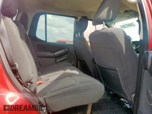 2010 Ford Explorer Sport Trac XLT z VIN 1FMEU3BE4AUF05128, wystawiony jako Copart lot #54847865 z przebiegiem Nie podano mil oraz Szkody całkowita. Historia ofert i sprzedaży dostępna na DreamBid. Obrazek 11.