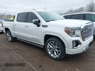 2020 GMC Sierra 1500 Denali with VIN 3GTU9FEL8LG295605, listed as a IAAI auction lot 41922060 with 65,561 mi miles and . Bid and sale history available at carsss.com. Image 1.