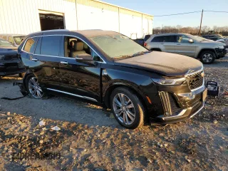 2023 Cadillac XT6 FWD Premium Luxury z VIN 1GYKPCRS7PZ105628, wystawiony jako Copart lot #84841124 z przebiegiem Nie podano mil oraz Szkoda całkowita • Salvage title. Historia ofert i sprzedaży dostępna na DreamBid. Obrazek 4.