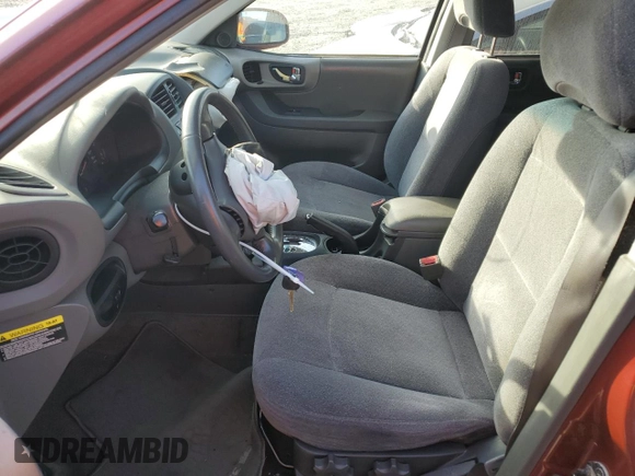 2003 Hyundai Santa Fe LX with VIN KM8SC73E63U489772, listed as a Copart auction lot 77115994 with 137,579 mi miles and Salvage Title. Bid and sale history available at carsss.com. Image 7.