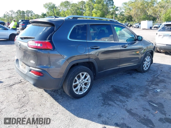 2016 Jeep Cherokee Altitude with VIN 1C4PJLCSXGW363598, listed as a IAAI auction lot 41670125 with 135,603 mi miles. Bid and sale history available at carsss.com. Image 4.