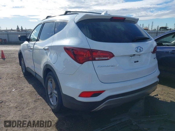 2017 Hyundai Santa Fe 2.4L z VIN 5XYZU3LB7HG438756, wystawiony jako IAAI lot #41480791 z przebiegiem 138 392 mil mil oraz . Historia ofert i sprzedaży dostępna na DreamBid. Obrazek 3.