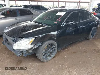 2014 Nissan Maxima S with VIN 1N4AA5AP9EC452289, listed as a IAAI auction lot 42422600 with 118,368 mi miles and . Bid and sale history available at DreamBid. Image 2.