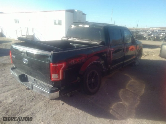 2015 Ford F-150 XLT with VIN 1FTEW1EP9FKE39940, listed as a IAAI auction lot 40991313 with 221,138 mi miles. Bid and sale history available at carsss.com. Image 4.