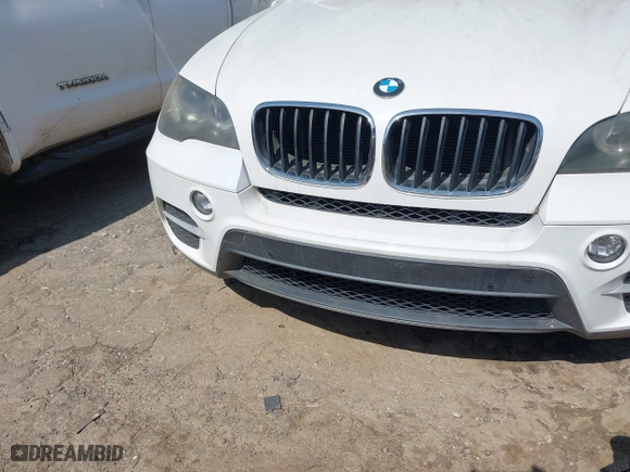 2011 BMW X5 35i with VIN 5UXZV4C54BL410338, listed as a IAAI auction lot 41930266 with 148,950 mi miles. Bid and sale history available at carsss.com. Image 6.