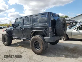 2014 Jeep Wrangler Unlimited Rubicon X с VIN 1C4HJWFG0EL142071, выставлен на аукционе Copart как лот 72898994 с пробегом 110 597 миль миль и Списание • Salvage title. История ставок и продаж доступна на DreamBid. Изображение 2.