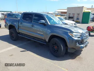2016 Toyota Tacoma SR5 z VIN 3TMAZ5CN7GM025872, wystawiony jako IAAI lot #41756429 z przebiegiem 114 707 mil mil oraz . Historia ofert i sprzedaży dostępna na DreamBid. Obrazek 1.