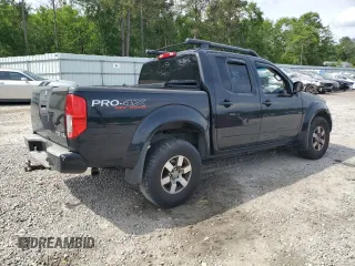 2012 Nissan Frontier Pro-4X z VIN 1N6AD0EV4CC405470, wystawiony jako Copart lot #54186715 z przebiegiem Nie podano mil oraz Szkoda całkowita • Salvage title. Historia ofert i sprzedaży dostępna na DreamBid. Obrazek 3.