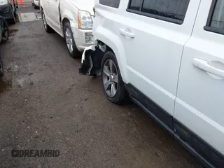 2016 Jeep Patriot Latitude with VIN 1C4NJPFAXGD749306, listed as a IAAI auction lot 41474439 with 94,767 mi miles and . Bid and sale history available at DreamBid. Image 18.