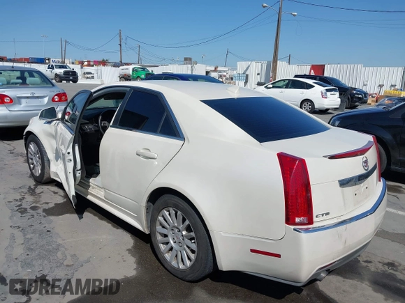2010 Cadillac CTS with VIN 1G6DA5EG7A0135451, listed as a IAAI auction lot 41964313 with 136,172 mi miles and . Bid and sale history available at DreamBid. Image 3.