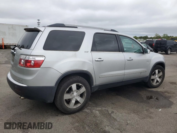 2010 GMC Acadia SLT1 z VIN 1GKLVMED8AJ135437, wystawiony jako Copart lot #59010535 z przebiegiem 101 589 mil mil oraz Czysty tytuł • Clean title. Historia ofert i sprzedaży dostępna na DreamBid. Obrazek 3.