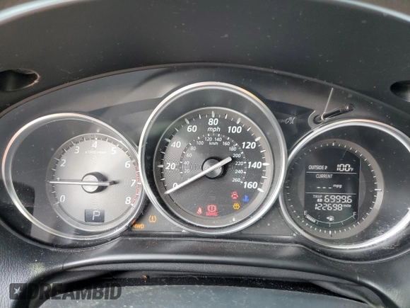 2015 Mazda CX-5 Sport with VIN JM3KE4BY9F0479748, listed as a Copart auction lot 58847805 with 122,698 mi miles and Salvage title. Bid and sale history available at DreamBid. Image 9.