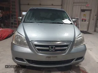 2007 Honda Odyssey EX-L with VIN 5FNRL38697B012944, listed as a IAAI auction lot 42144250 with 234,016 mi miles and . Bid and sale history available at DreamBid. Image 12.