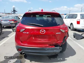 2015 Mazda CX-5 Grand Touring with VIN JM3KE2DY7F0537017, listed as a IAAI auction lot 41953011 with 78,098 mi miles. Bid and sale history available at carsss.com. Image 16.