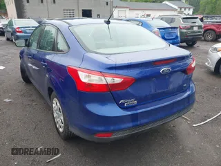 2012 Ford Focus SE with VIN 1FAHP3F23CL345654, listed as a IAAI auction lot 42231539 with 77,360 mi miles and . Bid and sale history available at DreamBid. Image 3.