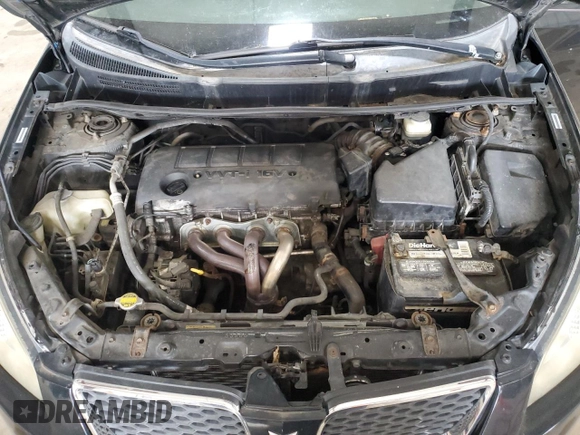 2009 Pontiac Vibe z VIN 5Y2SM67099Z410763, wystawiony jako Copart lot #57608015 z przebiegiem 172 308 mil mil oraz Tytuł czysty. Historia ofert i sprzedaży dostępna na DreamBid. Obrazek 11.