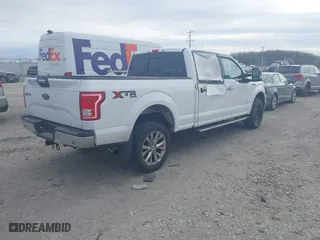 2015 Ford F-150 XLT w/HD Payload Pkg with VIN 1FTFW1EG5FKD45591, listed as a IAAI auction lot 41358244 with 134,081 mi miles. Bid and sale history available at carsss.com. Image 4.