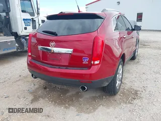 2014 Cadillac SRX Luxury Collection with VIN 3GYFNEE33ES544269, listed as a IAAI auction lot 41855086 with 182,825 mi miles. Bid and sale history available at carsss.com. Image 4.