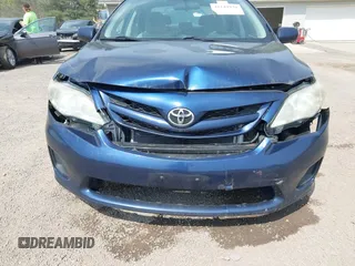 2013 Toyota Corolla L with VIN 5YFBU4EE8DP217364, listed as a IAAI auction lot 42144930 with 164,721 mi miles and . Bid and sale history available at DreamBid. Image 6.