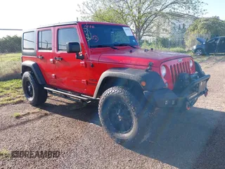 2015 Jeep Wrangler Unlimited Willys Wheeler with VIN 1C4BJWDG0FL635341, listed as a IAAI auction lot 41955393 with 145,529 mi miles and . Bid and sale history available at DreamBid. Image 1.
