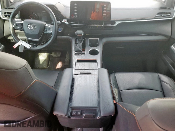 2021 Toyota Sienna XSE with VIN 5TDDRKECXMS011869, listed as a Copart auction lot 60333135 with 77,316 mi miles and Salvage title. Bid and sale history available at DreamBid. Image 8.