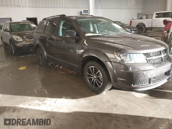 2018 Dodge Journey SE with VIN 3C4PDCAB1JT519745, listed as a IAAI auction lot 41366307 with 131,436 mi miles. Bid and sale history available at carsss.com. Image 1.