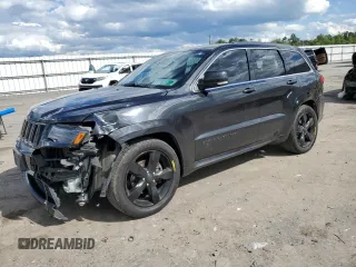 2015 Jeep Grand Cherokee High Altitude with VIN 1C4RJFCM0FC162739, listed as a Copart auction lot 58247705 with 171,367 mi miles and Salvage title. Bid and sale history available at DreamBid. Image 1.