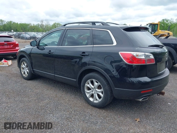 2011 Mazda CX-9 Touring z VIN JM3TB3CV6B0324256, wystawiony jako IAAI lot #42245746 z przebiegiem 128 420 mil mil oraz . Historia ofert i sprzedaży dostępna na DreamBid. Obrazek 3.