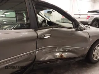 2006 Ford Taurus SE with VIN 1FAFP53U86A113947, listed as a IAAI auction lot 41753927 with 203,867 mi miles. Bid and sale history available at carsss.com. Image 17.